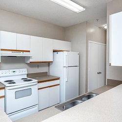 kitchen at Regal Park Apartments located in Forest Park, GA