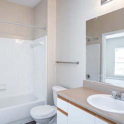 bathroom at Regal Park Apartments located in Forest Park, GA